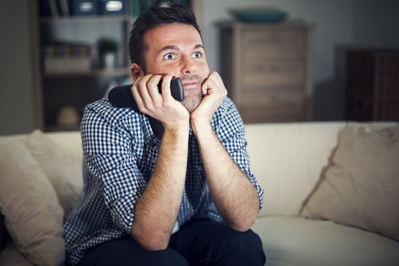 Guy Watching TV & Very Focused On The Screen